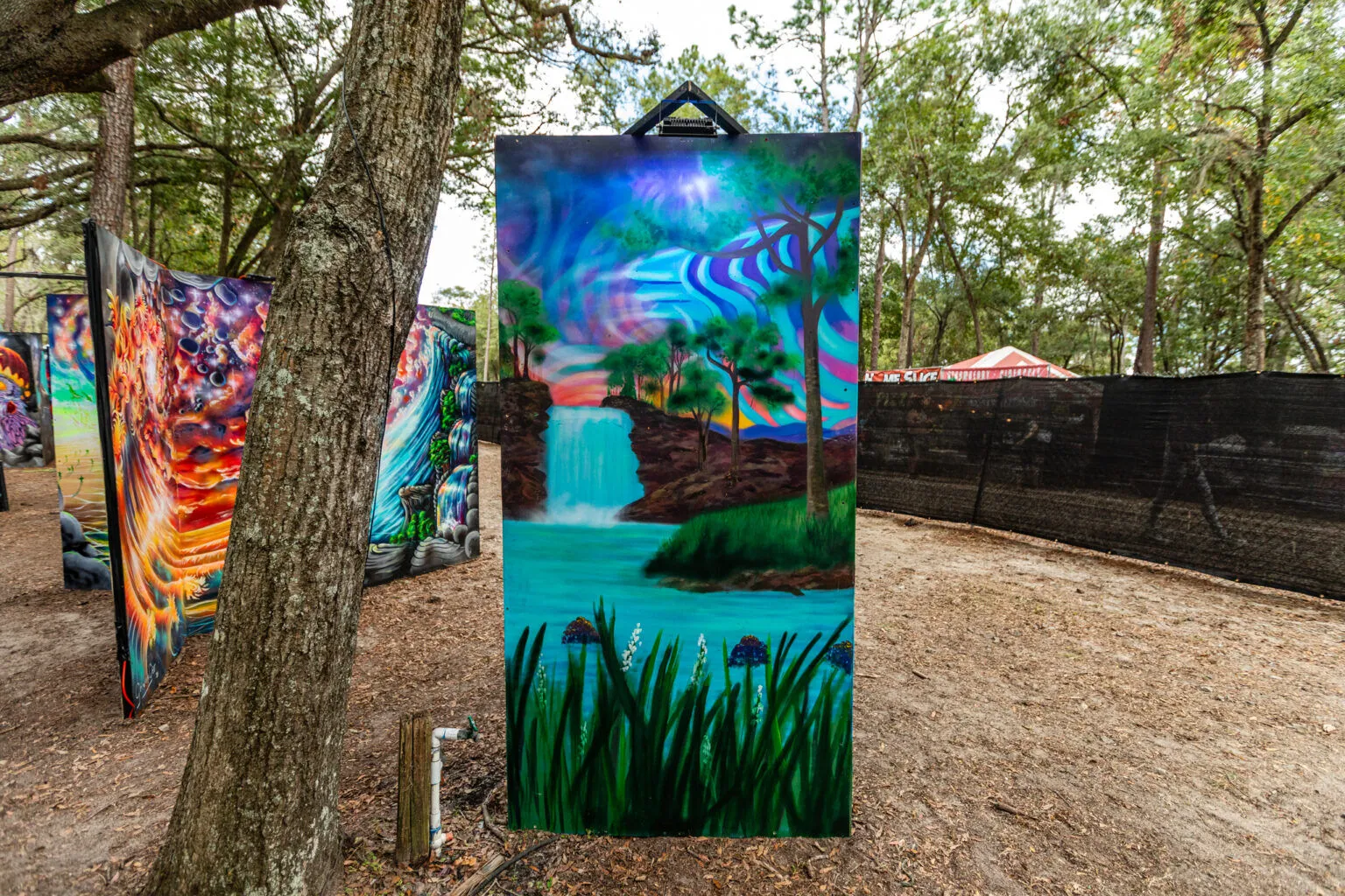A mural panel among the trees