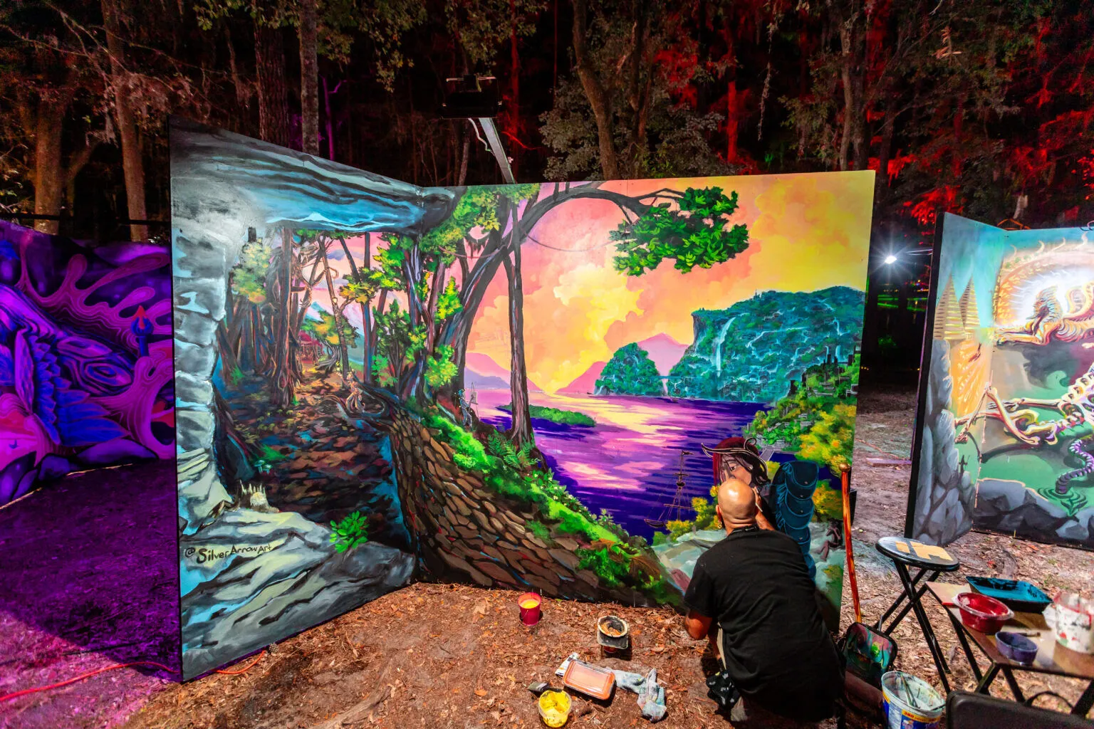 Artists painting murals