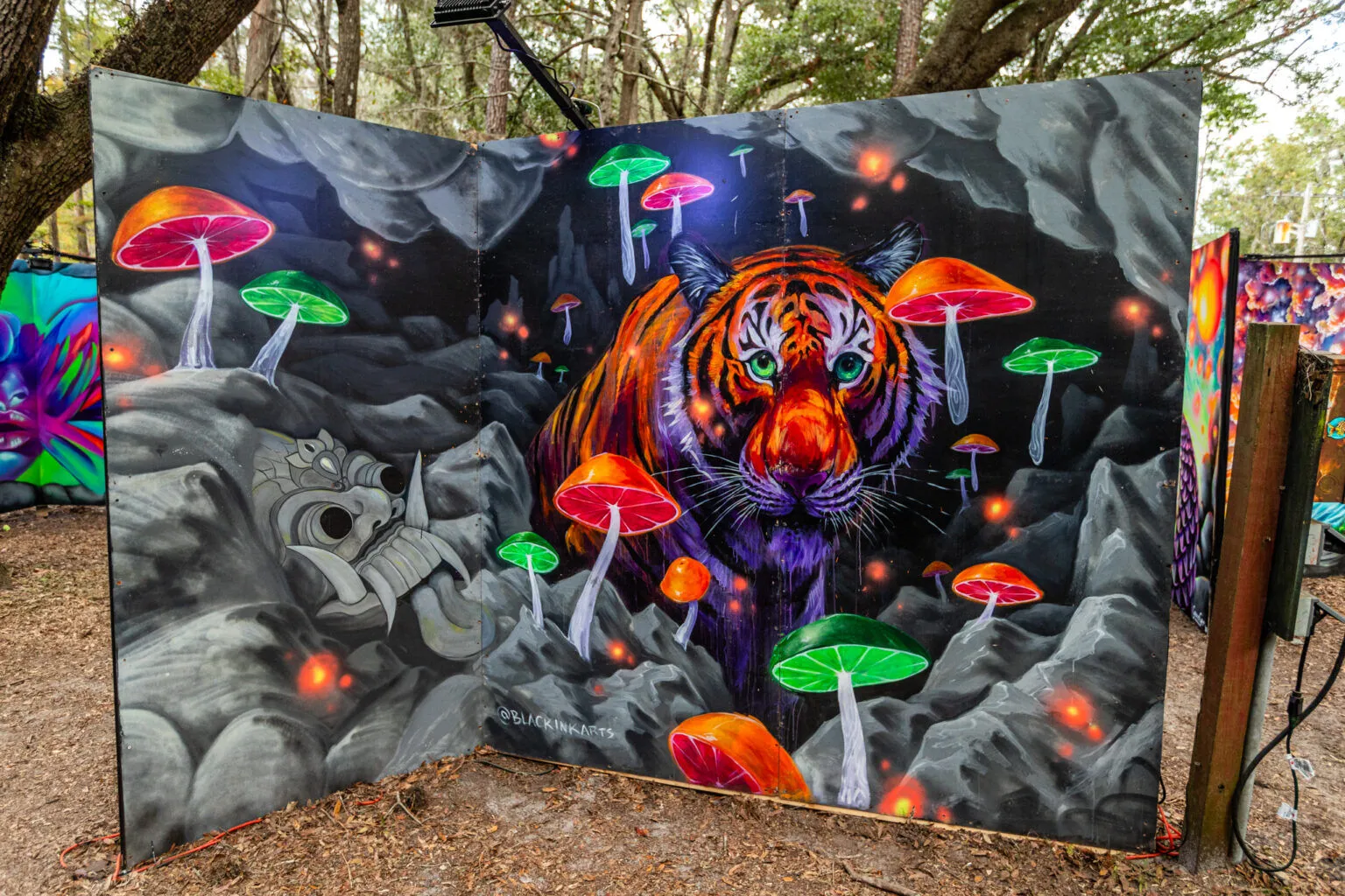 Tiger mural with glowing mushrooms